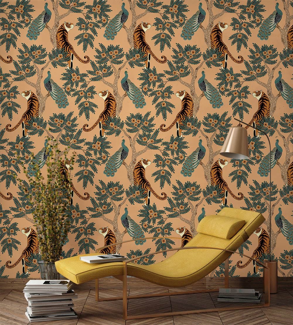 Vintage-style room with a tropical tiger and peacock mural wallpaper, yellow chaise longue, wooden flooring.