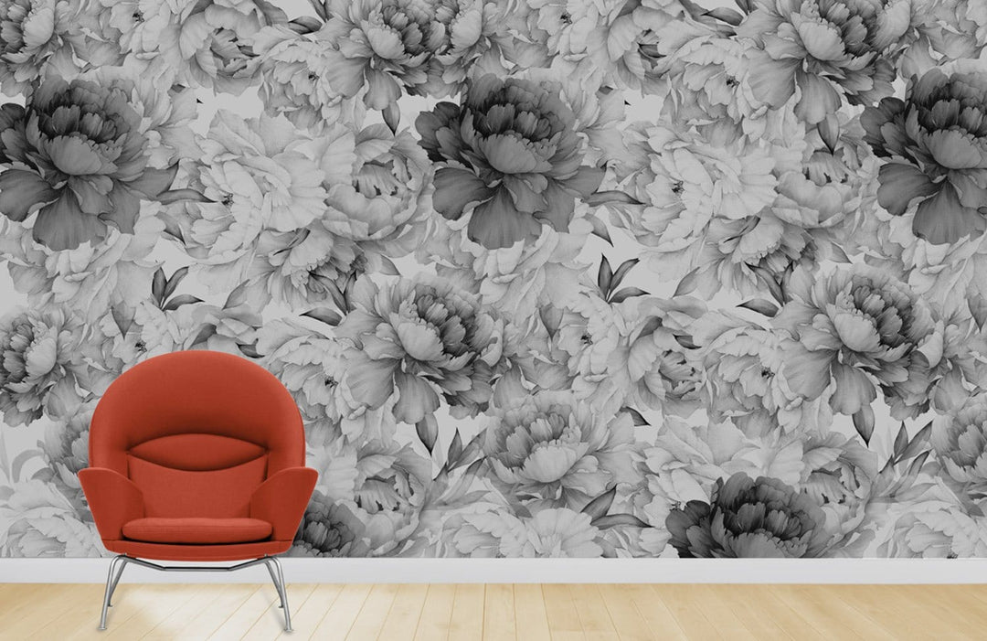 Elegant monochrome floral wallpaper with a classic black and white design, red chair, wooden flooring.