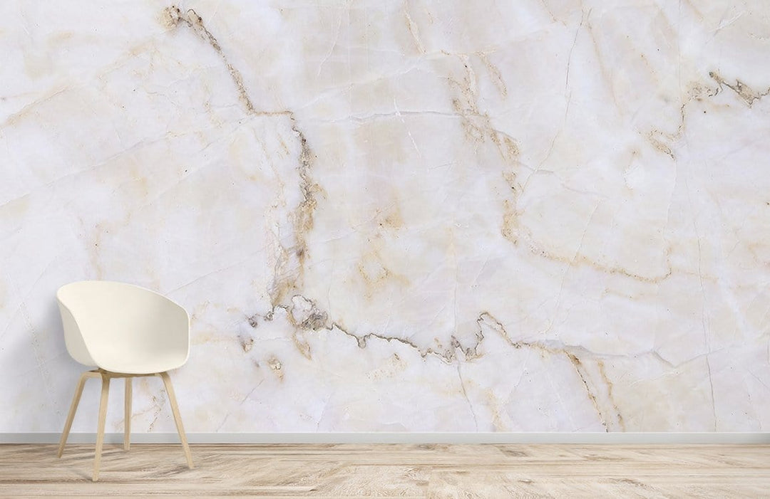 Elegant cream marble effect wall mural complements minimalist chair, light wood flooring in contemporary interior.