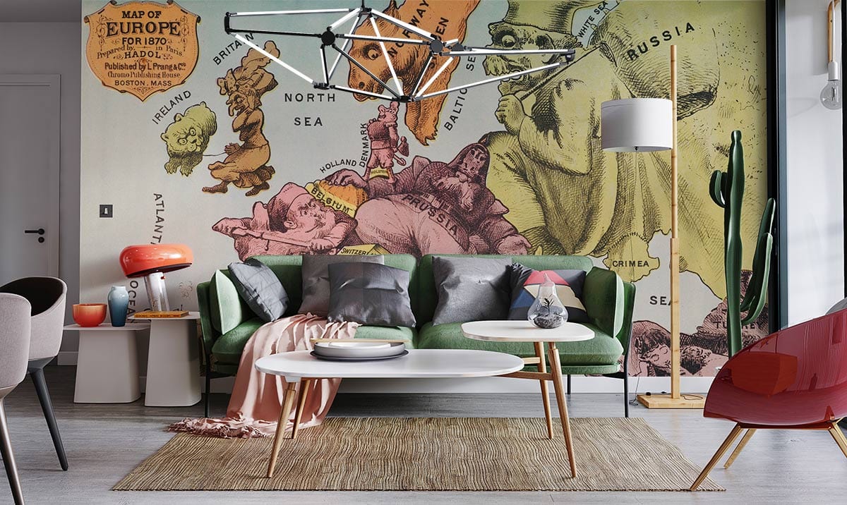 Vintage European map mural in modern living room with green sofa, grey cushions, and wood floor.