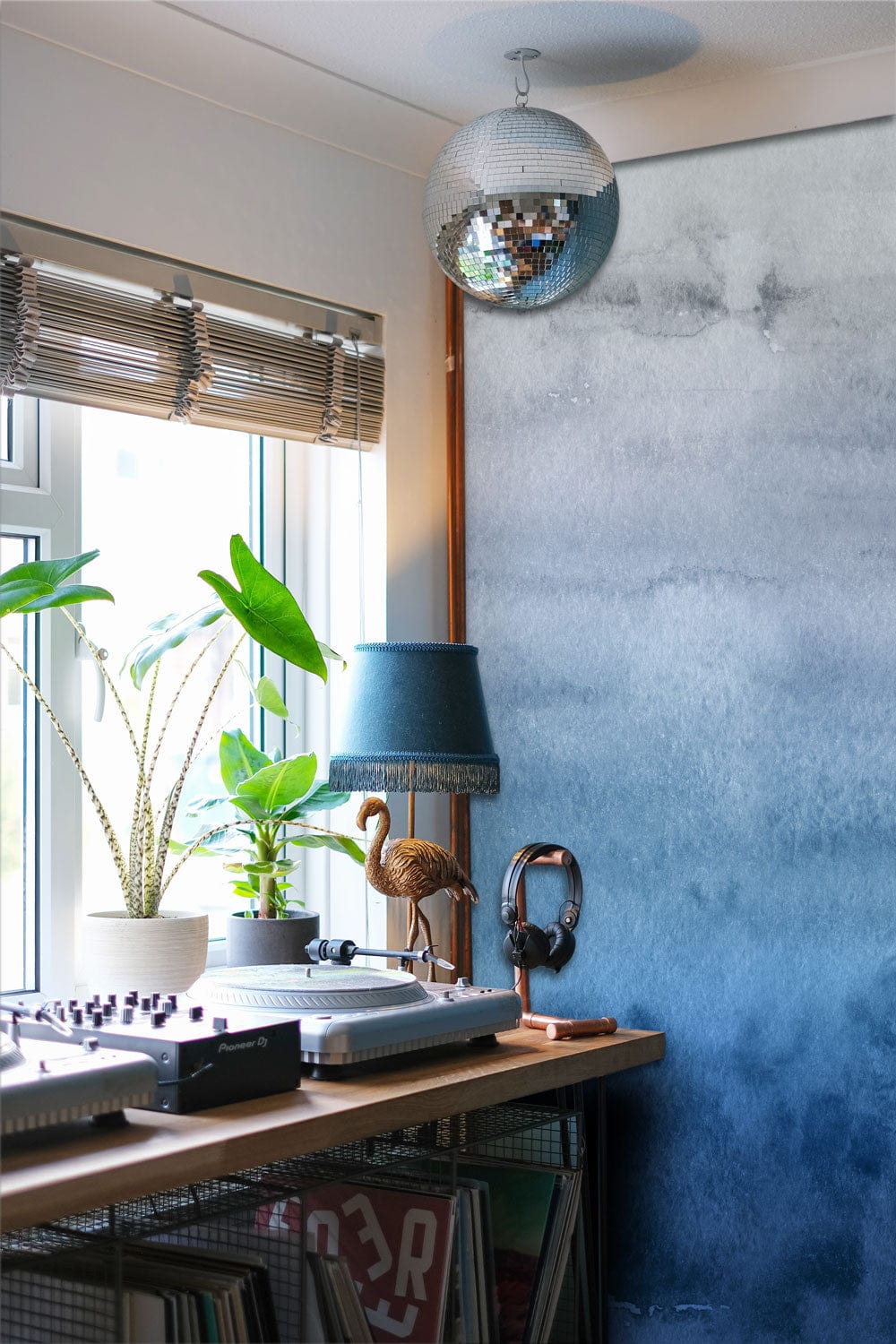 Blue Ombre Watercolour Gradient Mural Wallpaper in home office with disco ball and wooden blinds.