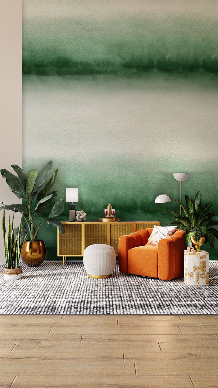 Contemporary green ombre wallpaper with orange armchair, wooden flooring, grey rug, and modern decor elements.