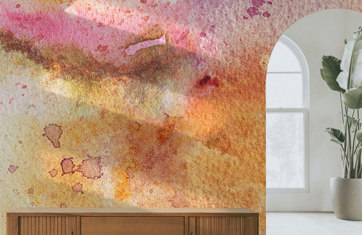 Abstract Watercolour Sunset Bliss Wall Mural with earthy tones, wooden sideboard, arched window, minimalist decor.
