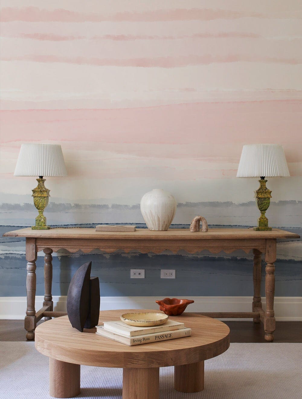 Serene Pastel Horizon watercolour mural with wooden table and round coffee table in elegant living room.