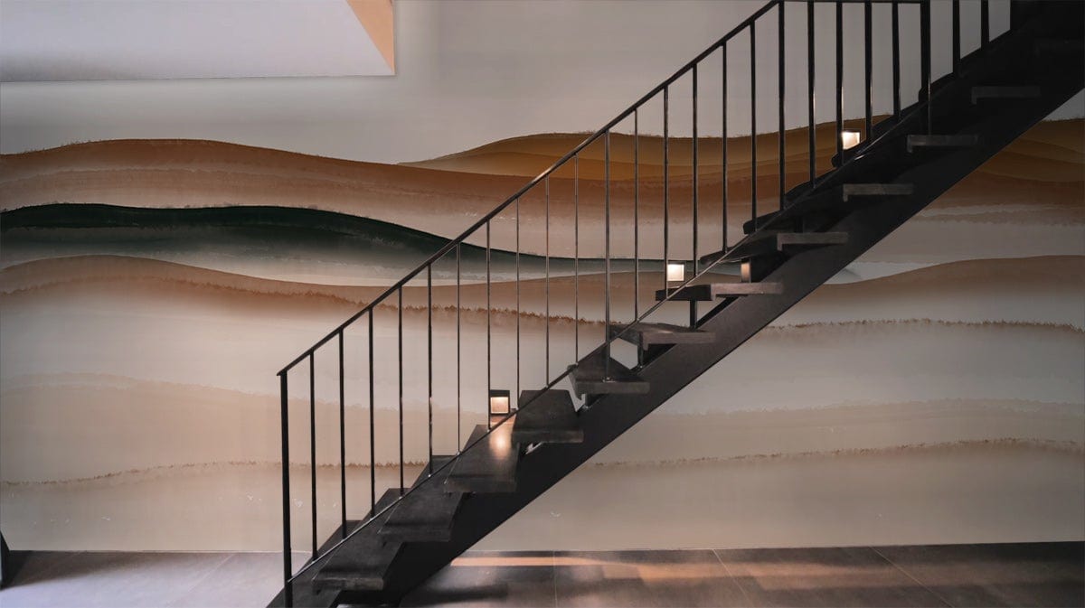 Contemporary earthy tones abstract mural wallpaper with modern black staircase, featured in sophisticated interior design.