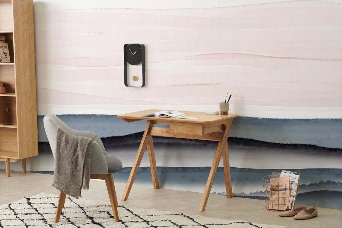 Contemporary Watercolour Horizon Mural Wallpaper in room with wooden desk, grey chair, and beige rug.