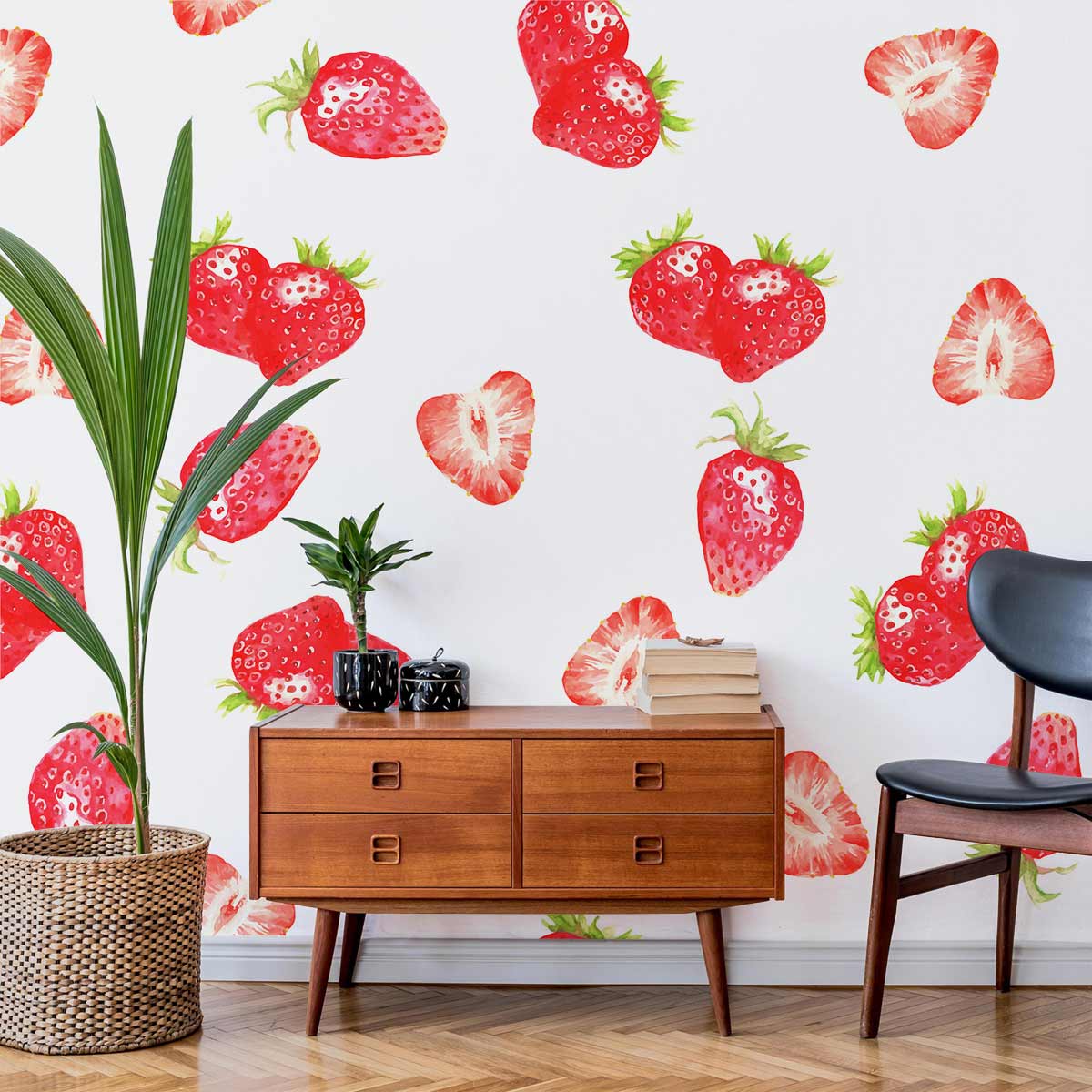 Vibrant red strawberry wallpaper in kitchen splashback decor, featuring wooden sideboard, black chair.