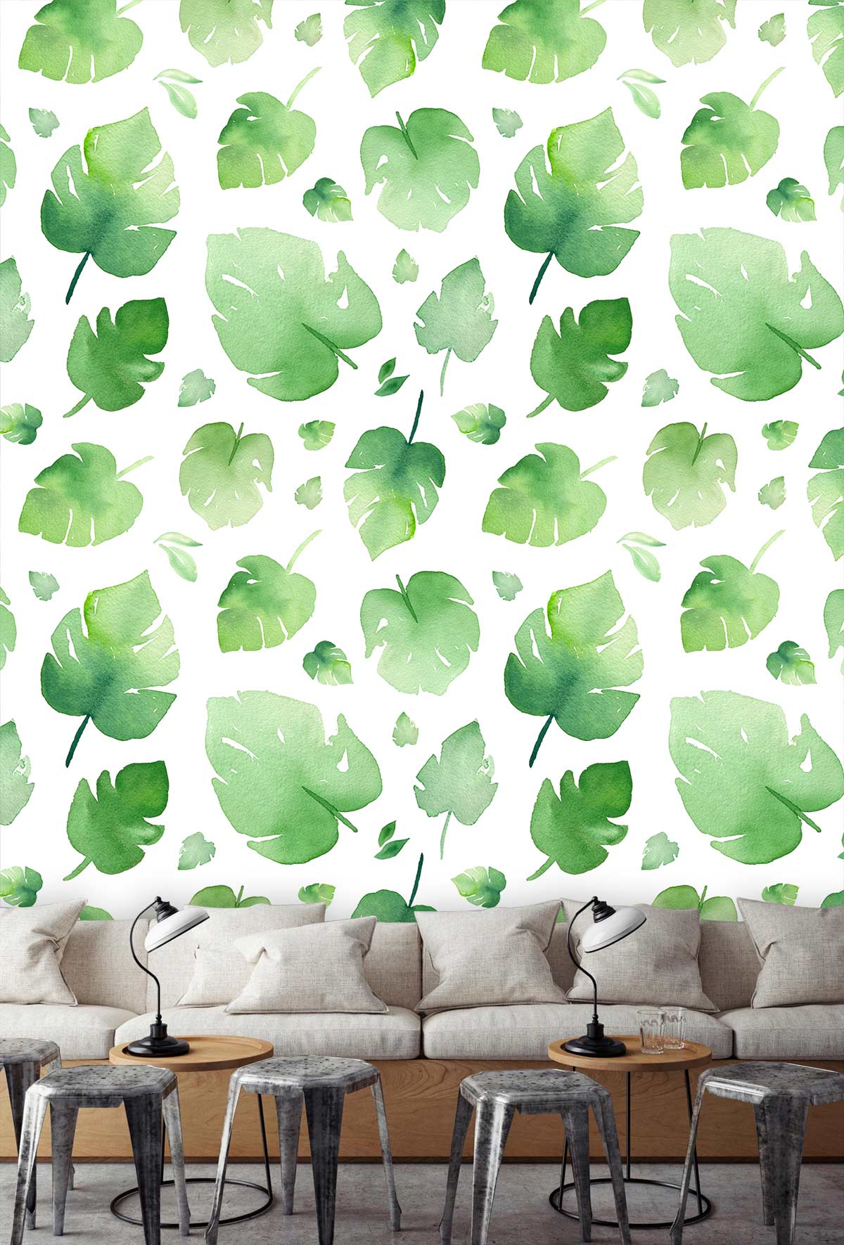 Botanical green leaf wallpaper with beige sofa, grey stools in modern living room decor.