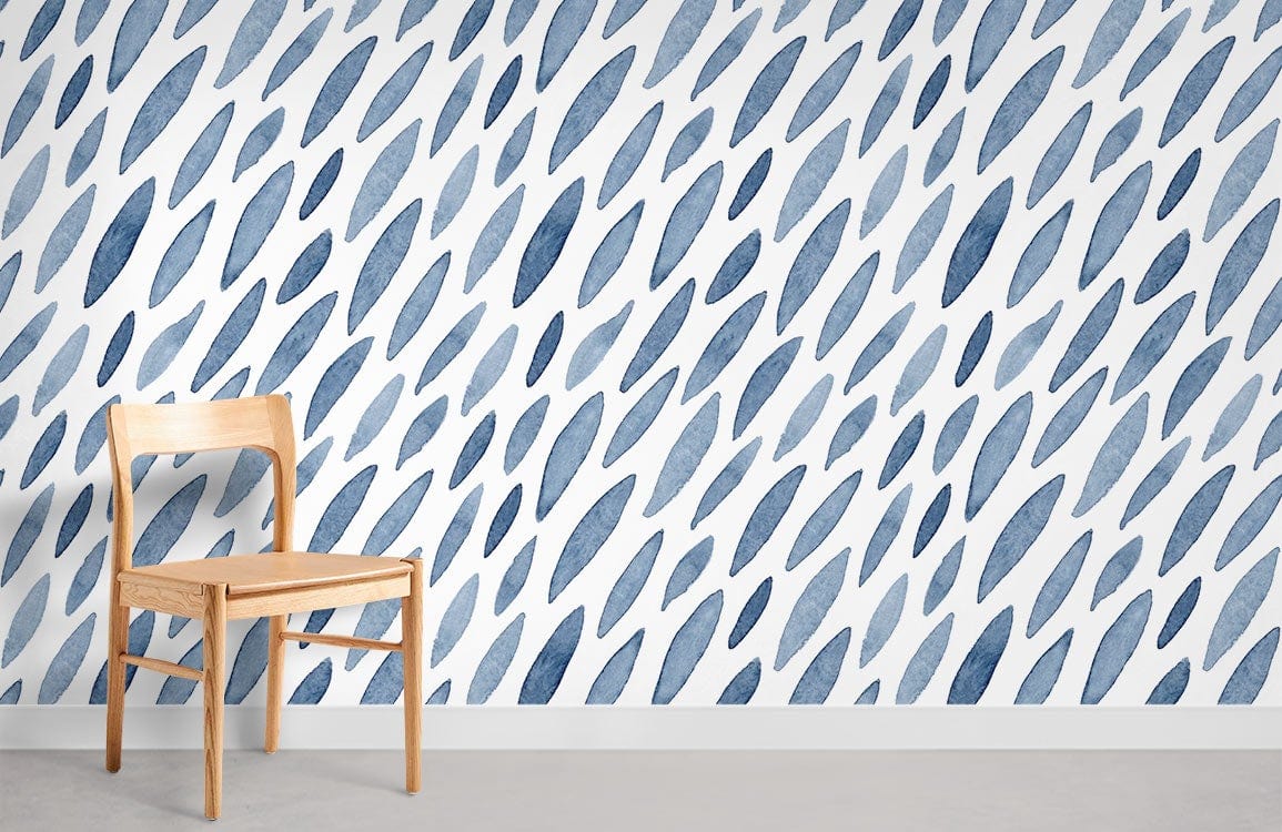 Blue abstract watercolour leaf wallpaper in modern decor with wooden chair on grey flooring.