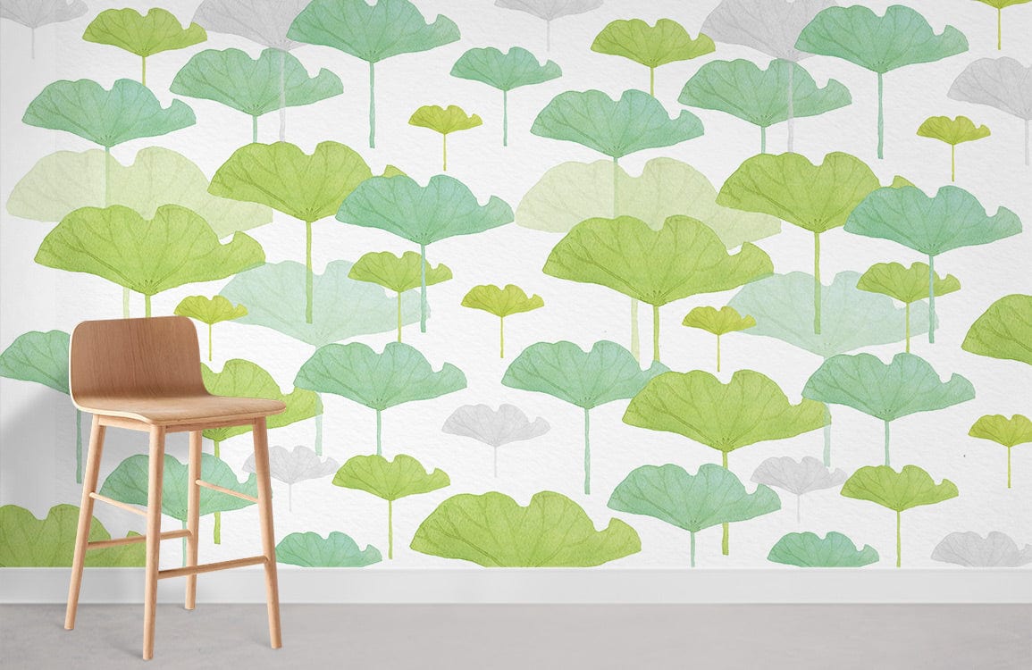 Serene Green Ginkgo Leaf Wallpaper with wooden stool, white wall, and concrete flooring, nature-inspired design.