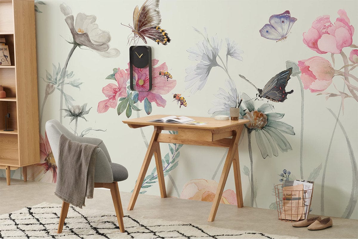 Vintage pastel floral butterfly mural wallpaper in a cosy study with wooden desk, grey chair, rug.