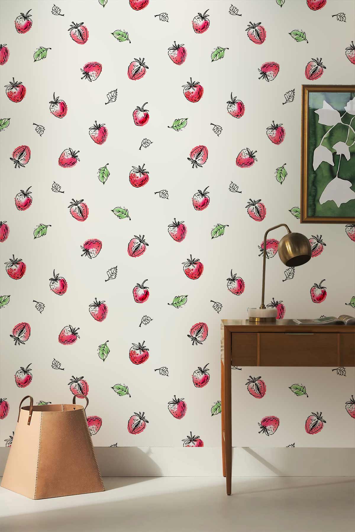 Charming hand-drawn strawberry wallpaper features delicate foliage, wooden console table, and modern lamp.