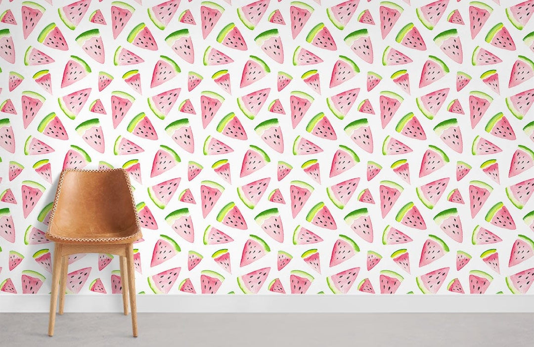 Brown leather chair against pink and green watermelon patterned wallpaper in a modern room setting.