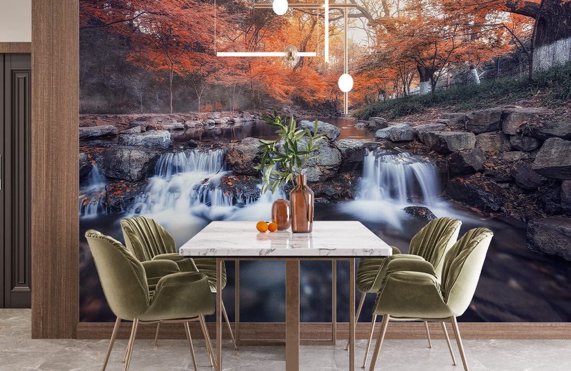 Autumn Serenity Stream Mural Wallpaper in dining room with green chairs, marble table, neutral flooring.
