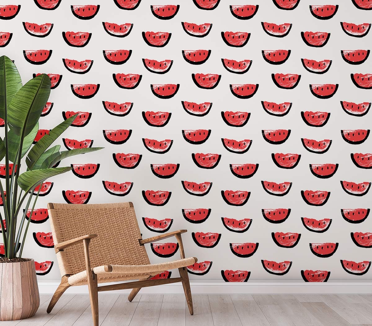 Playful red watermelon wallpaper in vibrant room with wicker chair on light wood flooring.