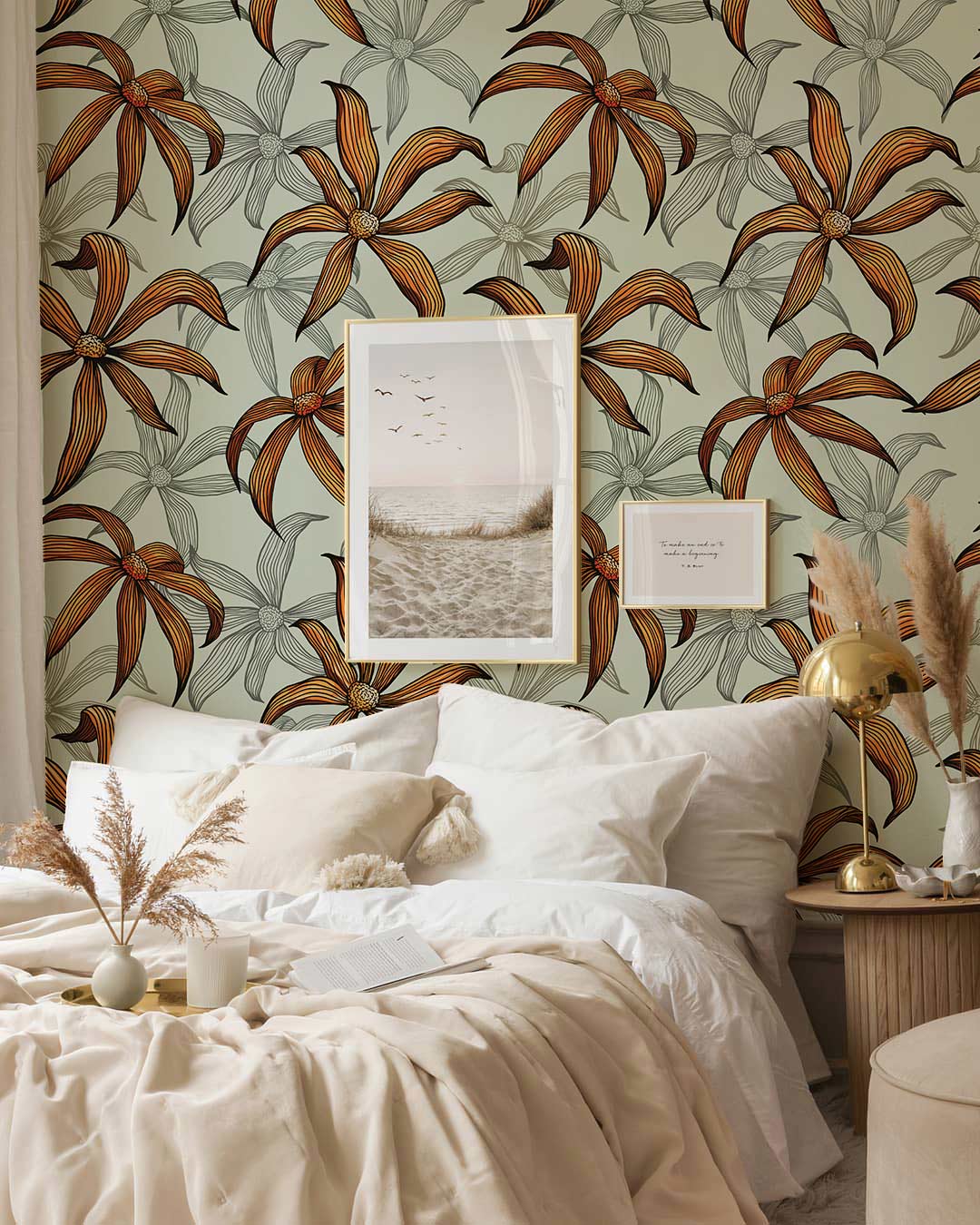 Vintage Botanical Floral Wallpaper in earthy tones behind white bed, gold lamp, and wall art.