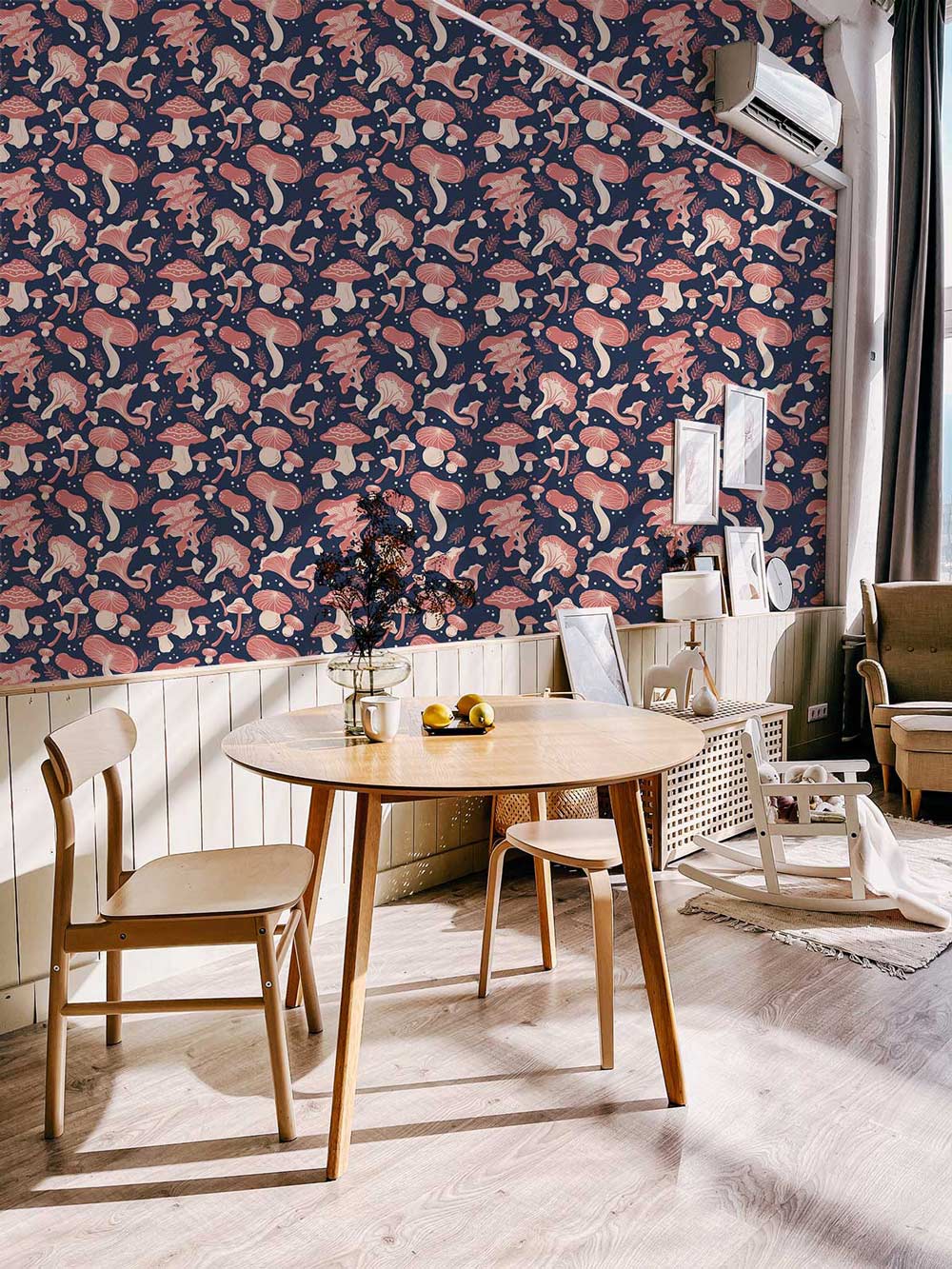 Whimsical Pink Mushroom Wallpaper in living room, round wooden table, chairs, beige walls, light flooring.