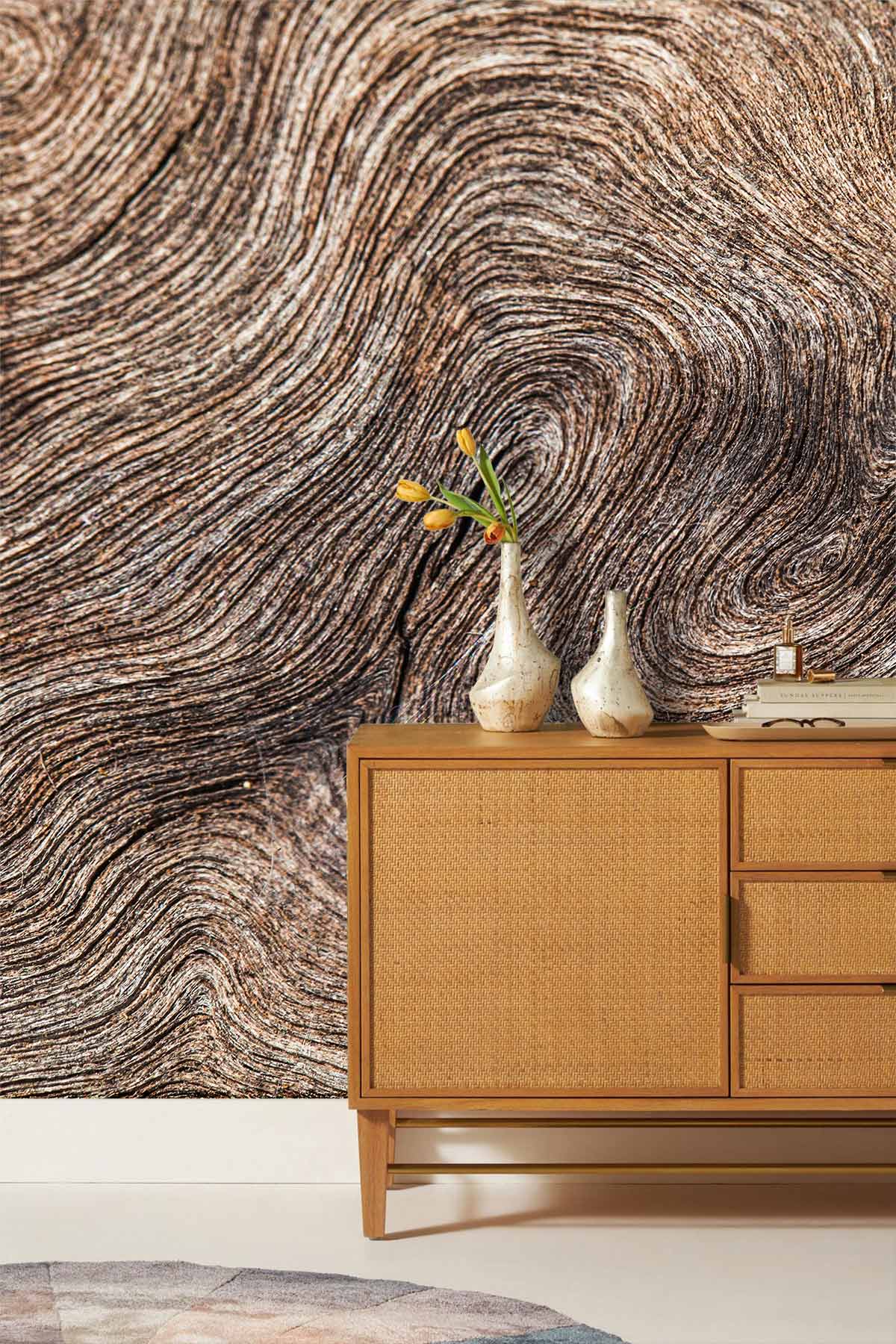 Rustic wood grain wallpaper in earthy brown, complements wooden sideboard, creating nature-inspired decor.