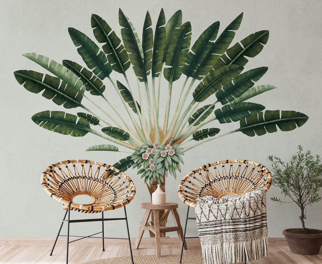 Vintage palm tree mural wallpaper, green tones, wicker chairs, light wood flooring, and cosy lounge setting.