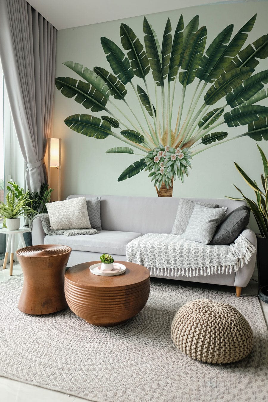 Vintage Tropical Palm Tree Mural Wallpaper, grey sofa, wooden tables, light rug, modern living room.