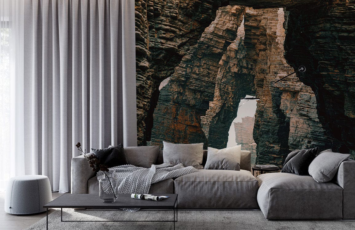 Cosy living room with Rustic Rock Formation Mural, grey sofa, and modern decor. Cliff arches design.