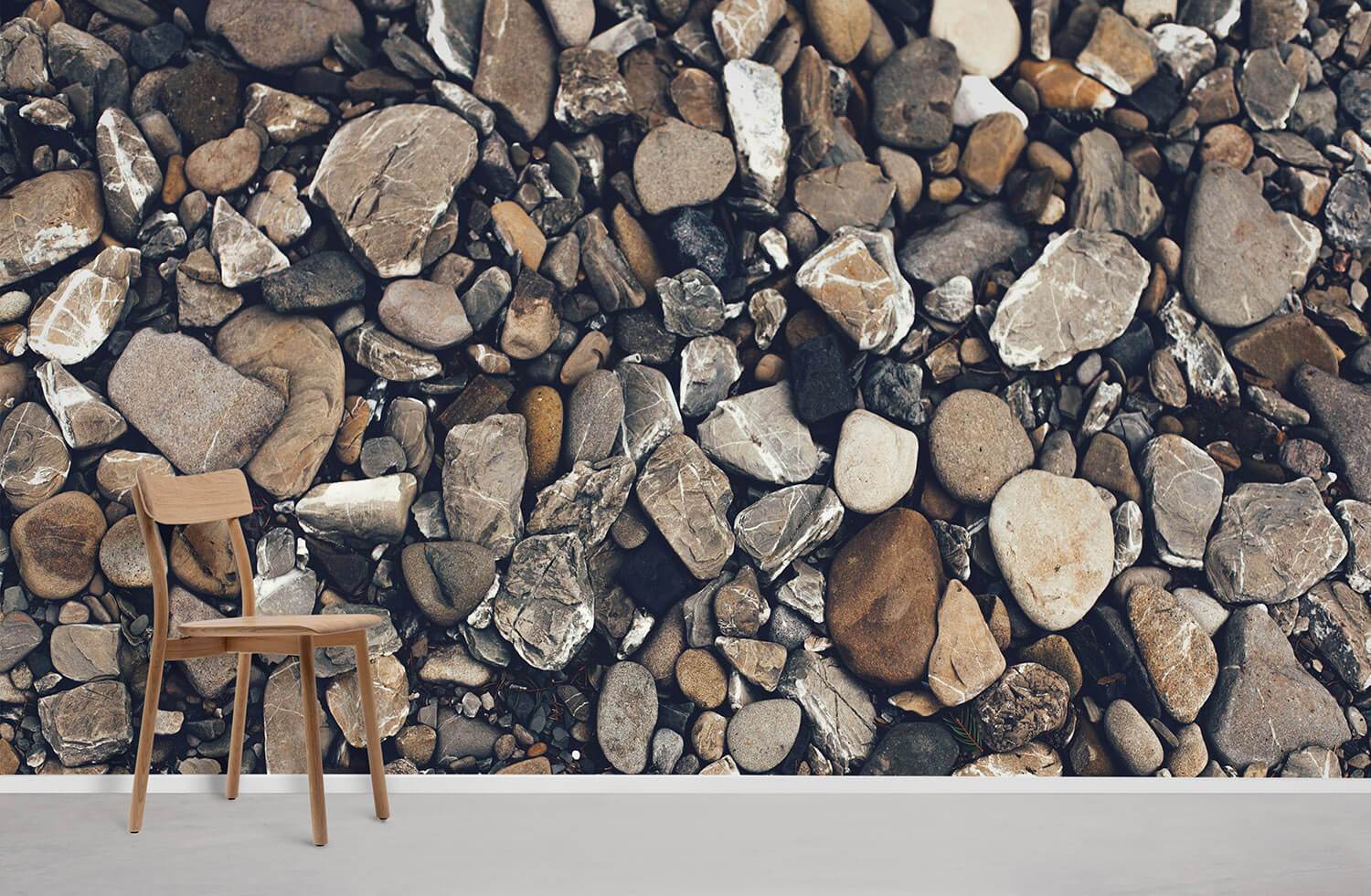 Rustic interior with Natural Stone Pebble Pattern Wallpaper, wooden chair, complements earth-toned Décor.