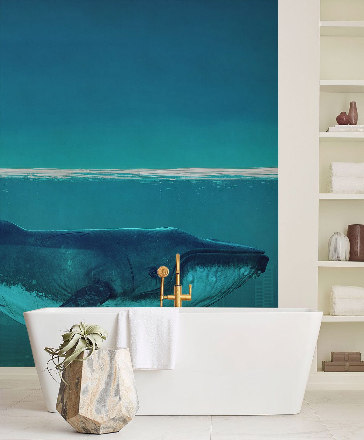Majestic Blue Whale mural wallpaper in bathroom with white tub, contemporary decor, and minimalist shelving.