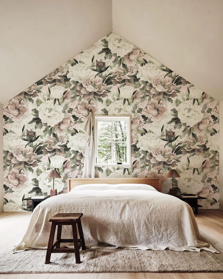 Bedroom with Vintage Floral Blossom Mural Wallpaper, wooden flooring, white bed linen, and rustic stool.