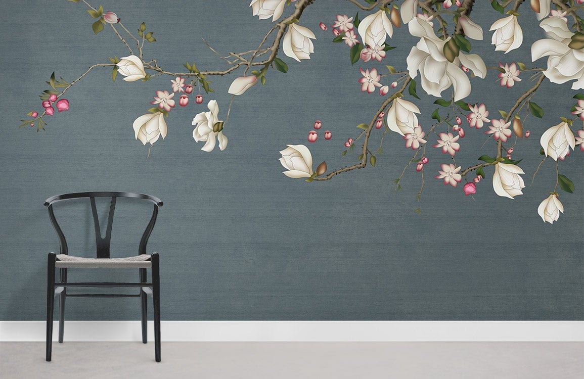 Elegant Floral Blossom Grey Mural Wallpaper, pink accents, black chair, grey wall, concrete flooring.