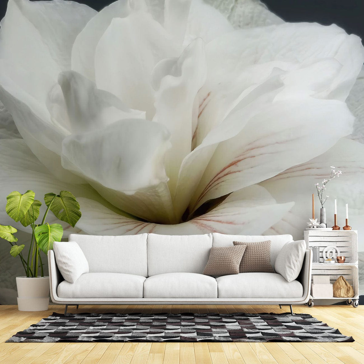Serene Blossom Mural Wallpaper with white sofa, geometric rug, wooden flooring, and elegant room decor.