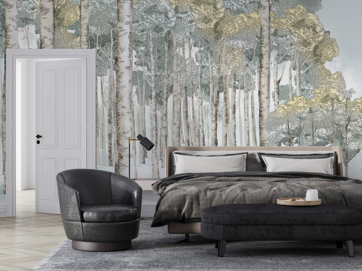 Tranquil winter forest mural wallpaper in bedroom with elegant bed, grey armchair, and stylish decor.
