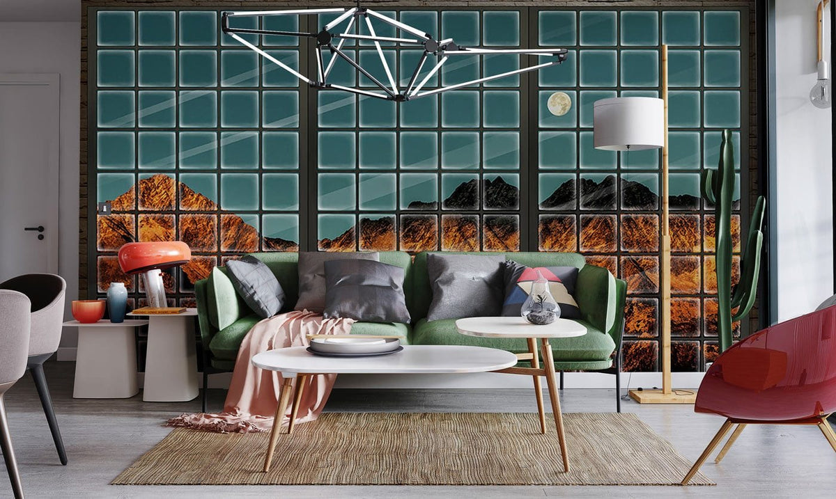 Green sofa room with Sunlit Mountain Landscape Mural Wallpaper, geometric chandelier, modern decor, wooden flooring.