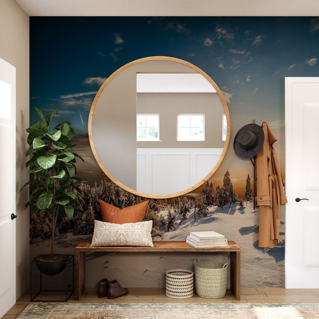Winter landscape mural wallpaper, circular mirror, bench with cushions, hallway decor, serene aesthetic, blue tones.