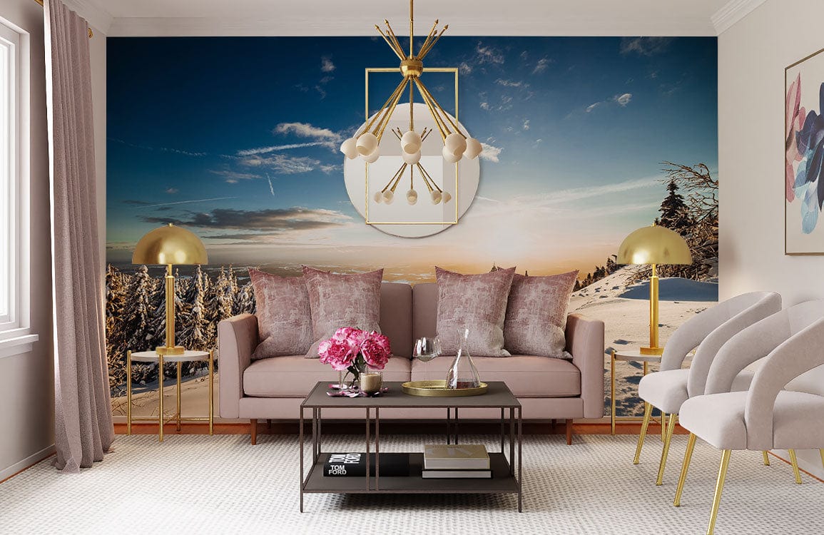Serene mural wallpaper in living room with pink sofa, gold lamps, beige armchairs, and beige carpet.