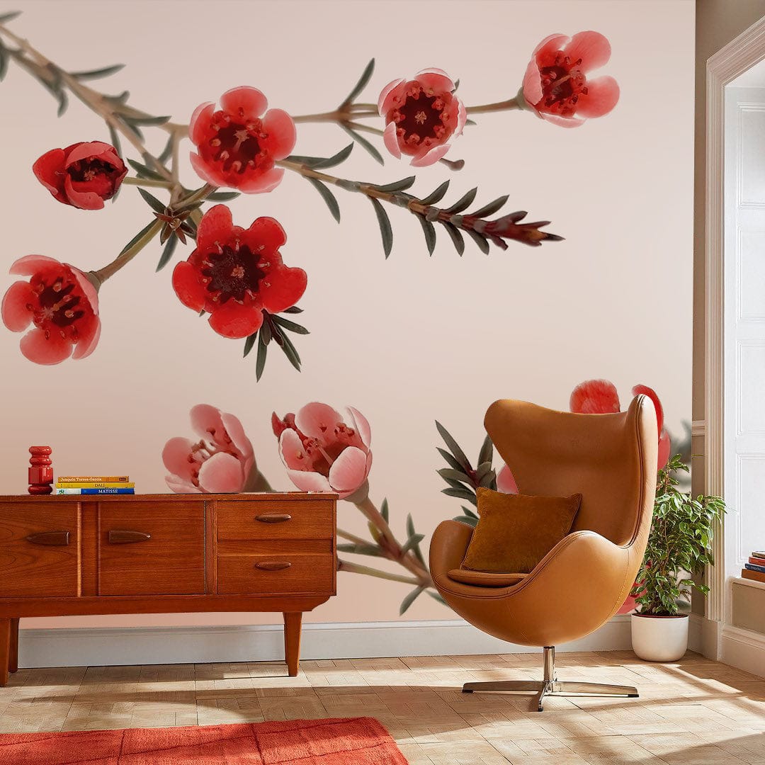 Elegant red floral wallpaper with a minimalist design, featuring a brown sofa, wooden flooring.