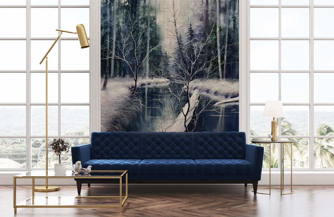 Elegant lounge with Enchanted Winter Forest mural, deep blue sofa, gold accents, and wood flooring.