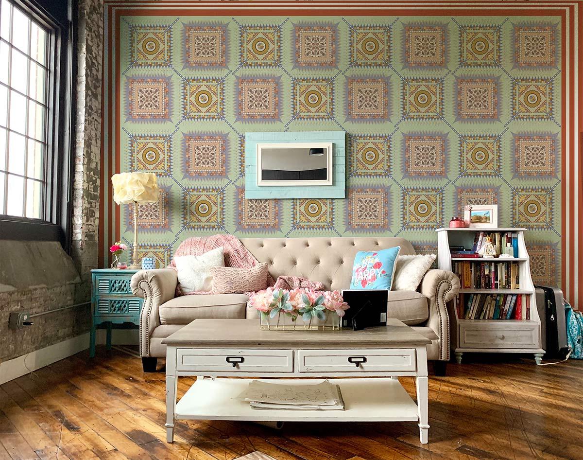 Geometric vintage teal and orange wallpaper mural in living room with beige sofa and wooden flooring.