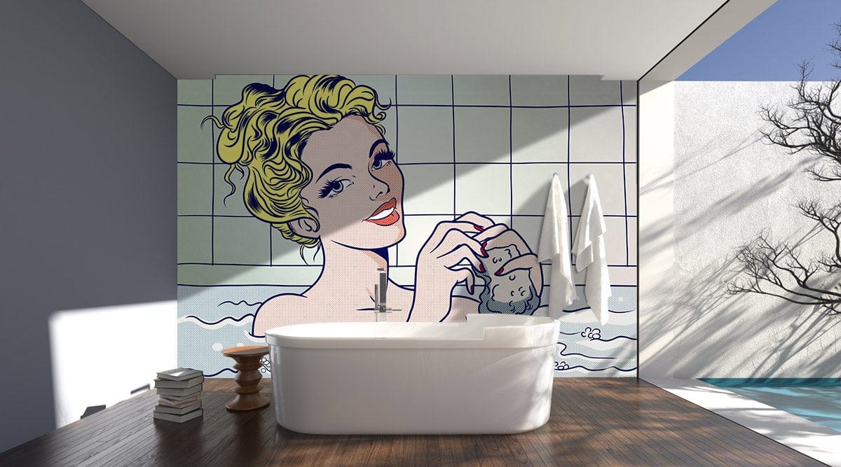 Retro pop art mural wallpaper in bathroom with freestanding bath, wooden floor, and blue walls.