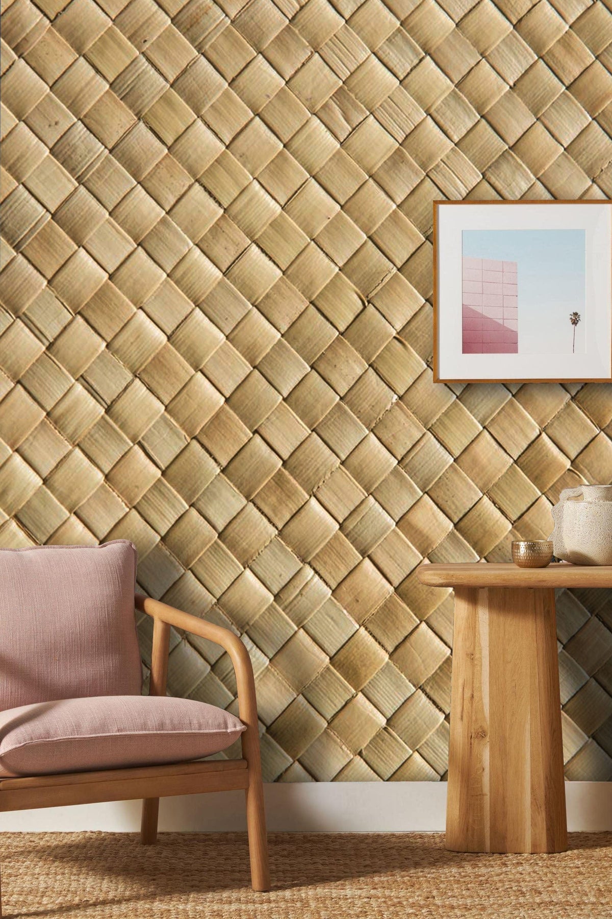 Natural woven bamboo wallpaper in beige, rustic elegance, wooden furniture, pink chair, framed art.