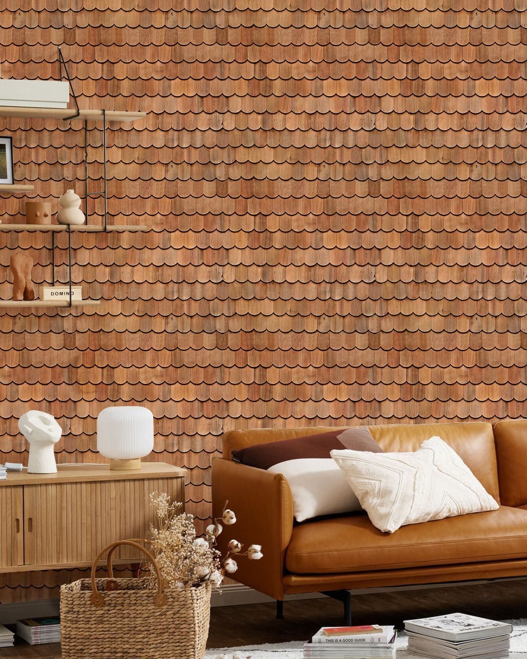 Rustic Red Brick Patterned Wallpaper in living room with brown leather sofa and wooden shelving.