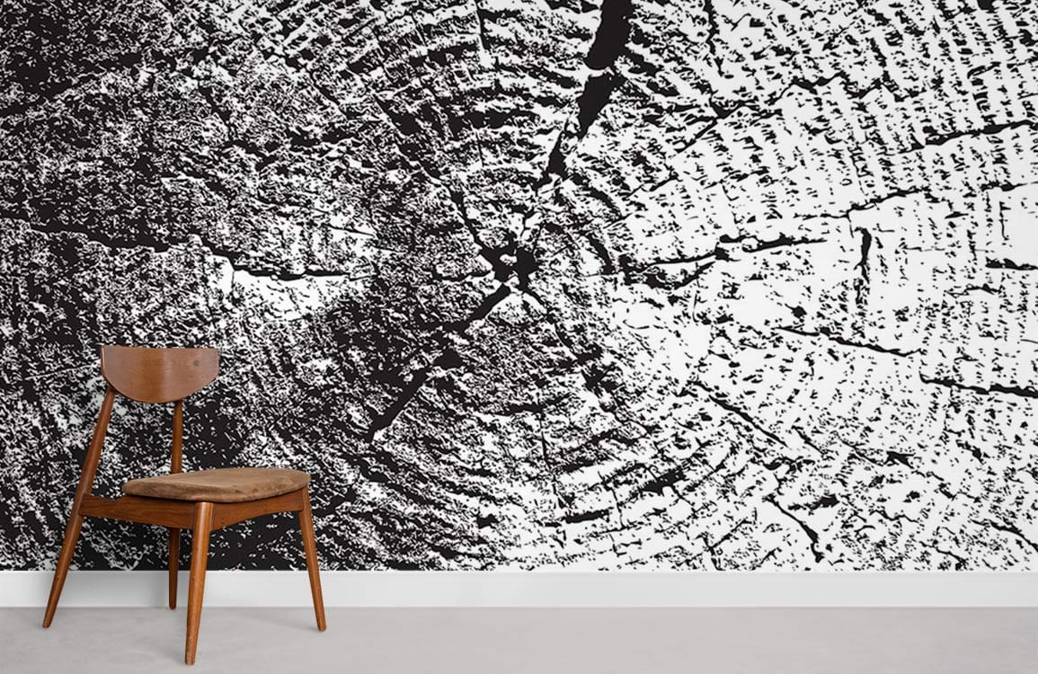 Monochrome tree rings mural with chair, rustic black and white wallpaper design in modern living room.