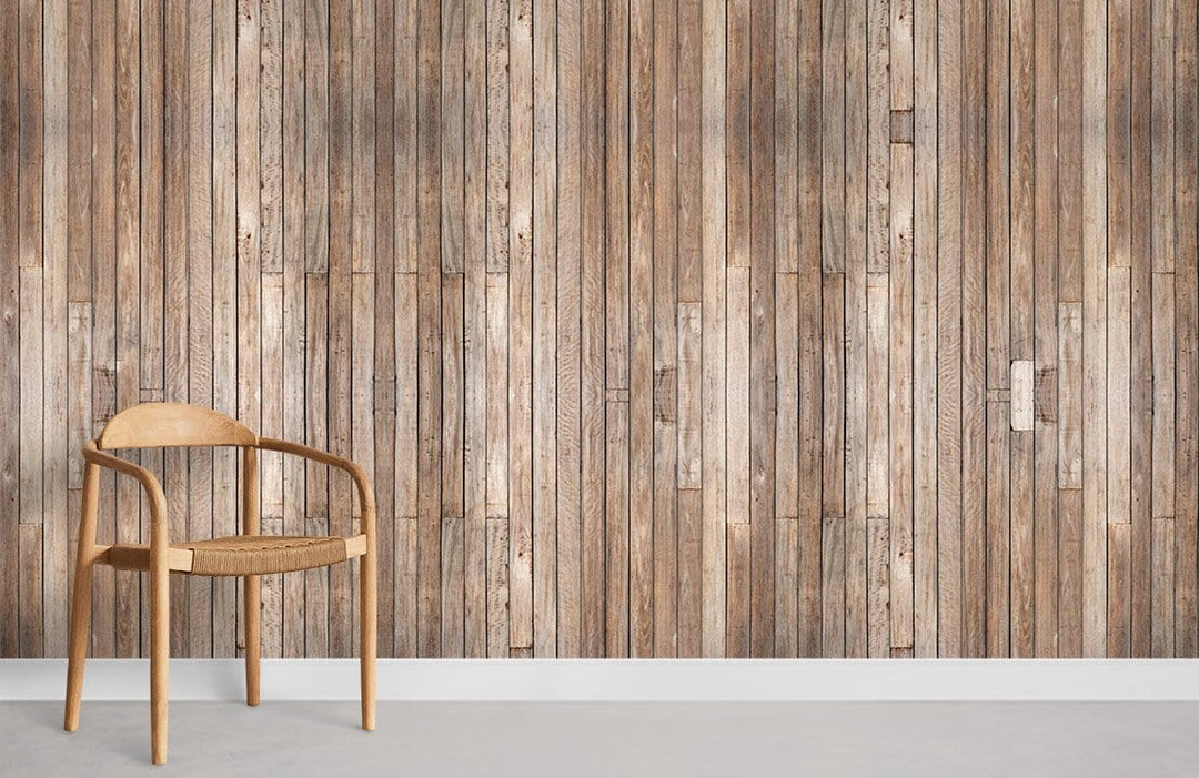 Rustic brown timber wallpaper on wall with wooden chair, grey flooring, enhancing homely decor atmosphere.