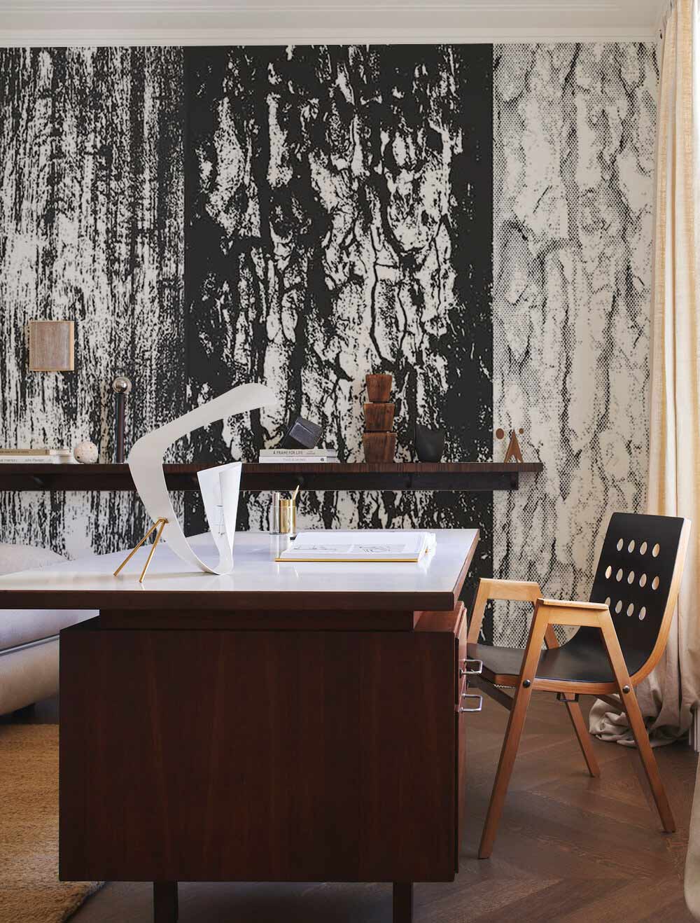 Rustic tree bark patterned wallpaper in modern living room; monochrome style, wood furniture, neutral flooring.