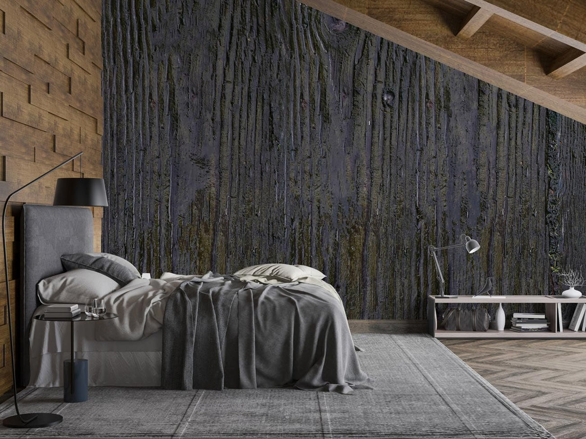 Rustic Charcoal Wood Texture Wallpaper in bedroom with grey bed, wooden flooring, contemporary decor.