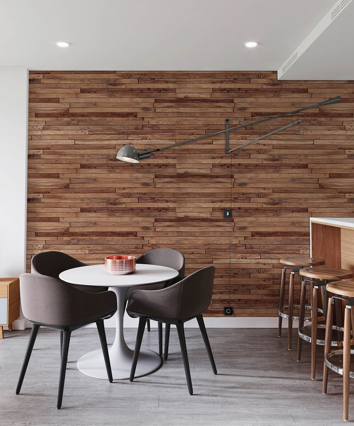 Rustic wooden plank wallpaper in warm brown tones, modern dining room setting with grey chairs.