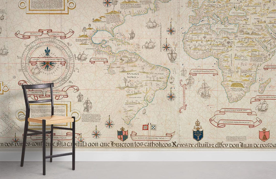 Vintage World Map Mural Wallpaper, sepia tones, classic nautical design, wooden chair, light flooring.