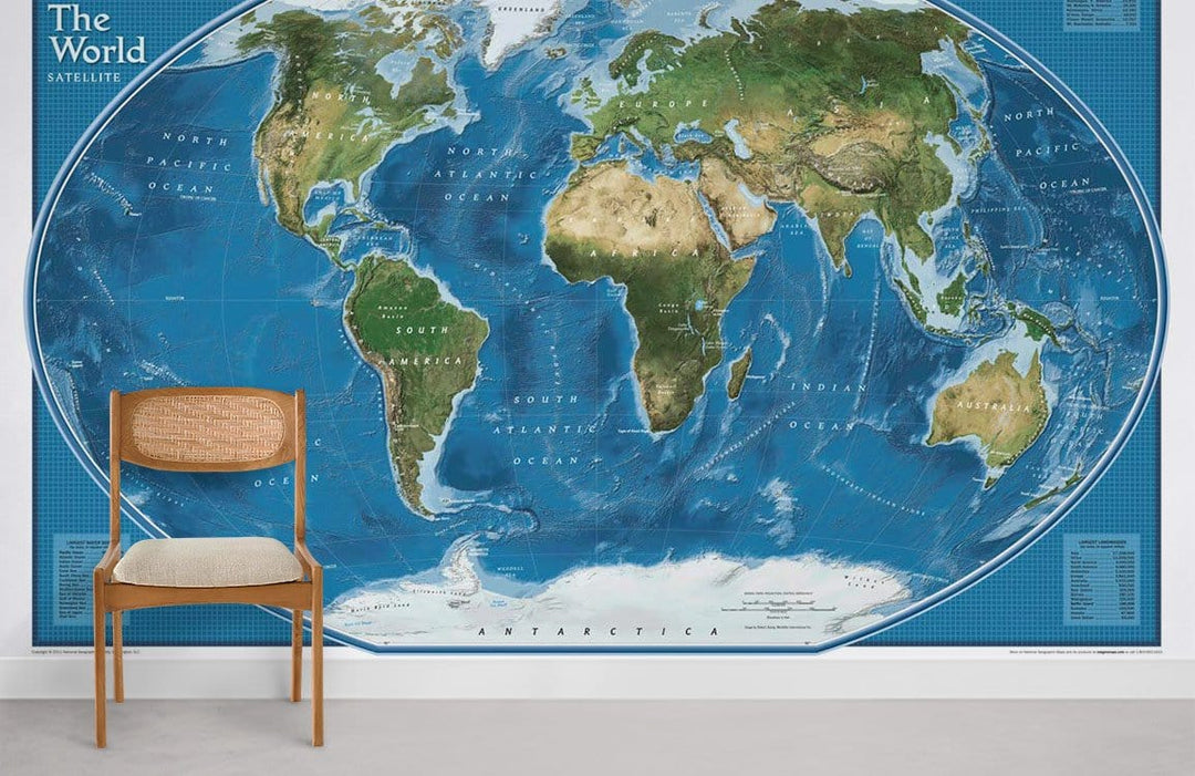 Vintage World Map Mural Wallpaper; blue tones; wooden chair; white walls; educational decor.