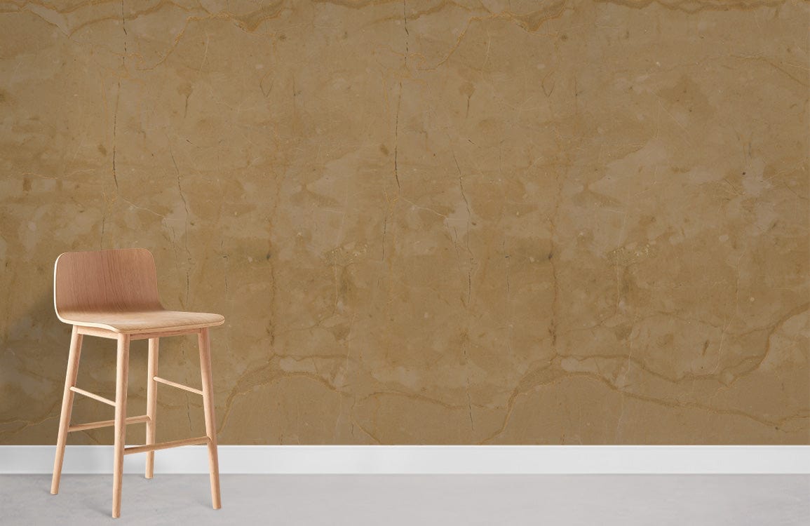 Elegant beige marble-effect wallpaper with wooden stool, complementing light grey flooring in a minimalist interior.