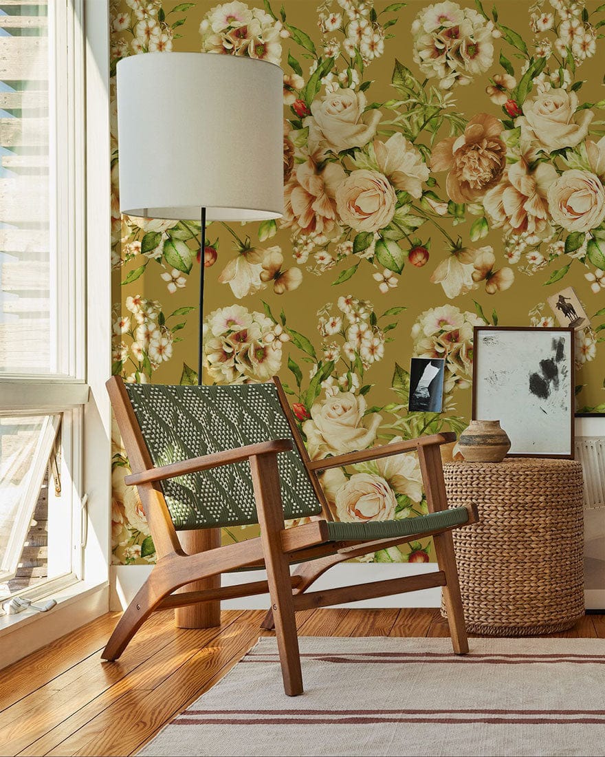 Beige floral mural wallpaper by Vintage Floral Elegance in living room with wooden chair, lamp.