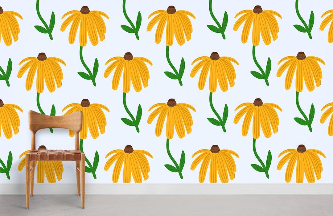 Sunny yellow floral patterned wallpaper with green stems, light wooden chair, grey floor, vibrant decor.